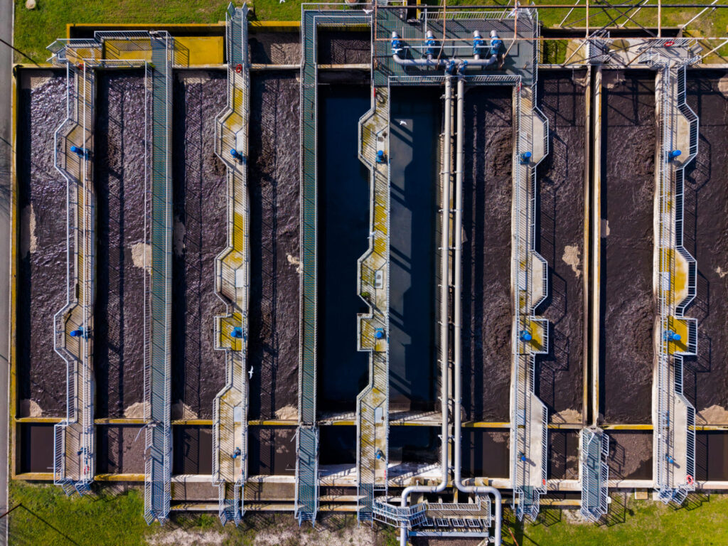 Water treatment facility with multiple treatment channels and structures in operation during