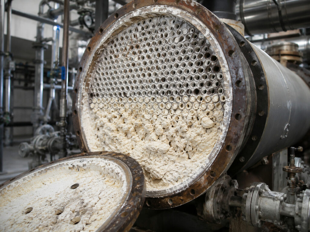 Corroded heat exchanger with scale