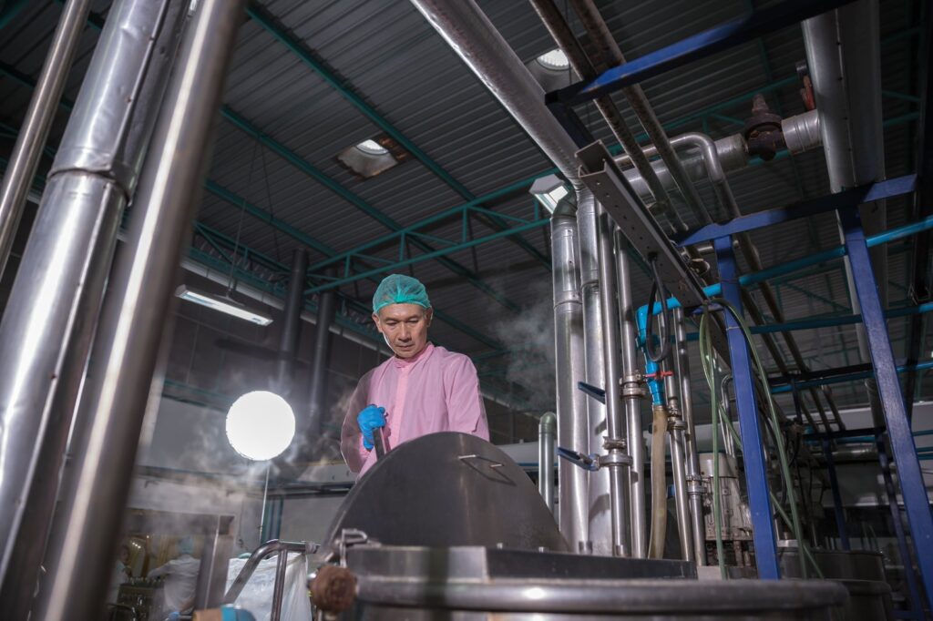 Worker in beverage factory